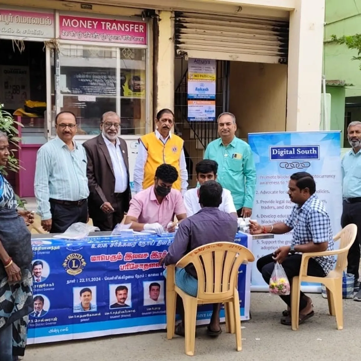 A group of people with their hands together