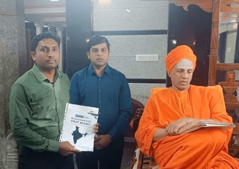 Blockchain for Viksit Bharat book presented to Swamiji